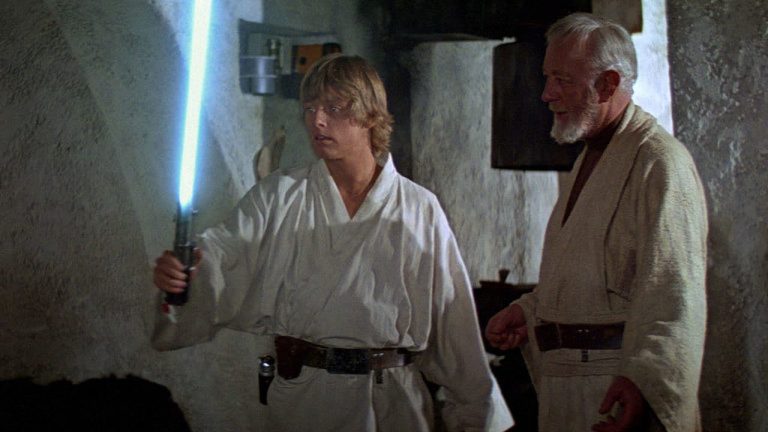 Obi-Wan gives Anakin's second lightsaber to his son, Luke